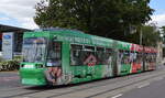 Die Magdeburger Verkehrsbetriebe mit dieser mit mit Ganzwerbung versehenen TRAM vom Typ NGT8D ((Firmen-Nr.1312) am 27.07.22 Magdeburg-Neustadt.