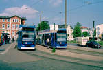 Hansestadt Rostock RSAG SL 4 (6NGTWDE 680) / SL 1 (6NGTWDE 658) Stadtmitte, Hauptbahnhof / Konrad-Adenauer-Platz am 4. August 2000. - Scan eines Farbnegativs. Film: AGFA HDC 200-plus-2. Kamera: Minolta XG-1.