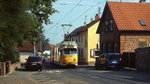Anfang Oktober 2010 passiert der Sechsachser 1017 mit sechsachsigem Beiwagen die idyllische Ortsdurchfahrt in Ellerstadt.
