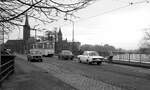 BVB Ost-Berlin__Zug der Linie 84 nach Friedrichshagen auf der Damm-Brücke über die Spree in Köpenick.__28-01-1978
