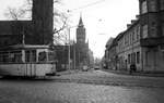 BVB Ost-Berlin__Linie 86 vor den Türmen Köpenicks (Ev. Kirche und Rathaus) in richtung S-Bhf. Köpenick unterwegs.__28-01-1978