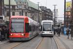 BREMEN, 12.03.21018, links Wagen 3107 als Linie 1 nach Huchting und rechts Wagen 3115 als Linie 1 nach Bf Mahndorf, beide in der Haltestelle Am Brill