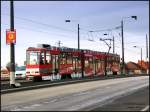 Tram 150 der Cottbusverkehr mit ausnahmsweise farblich auch zur eigenen Firma passender Ganzfahrzeugwerbung.