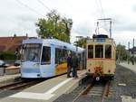 HEAG mobiTram ST14 Wagen 0776 und ST3 Wagen 57 am 07.10.17 in Darmstadt Kranichstein. An diesen Tag fuhr die Linie 120 zum Jubiläum der HEAG (120 Jahre) mit Blumensträußen an der Front