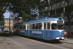 Dortmund Tw 73 an der Endstelle Westfalenhtte vor der Kulisse der Hoesch-Werke in der Oesterholzstrae, 18.06.1988.