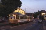 Dortmund Tw 203 mit Bw 812 auf der allmorgendlichen Runde in Brackel, 27.05.1992.