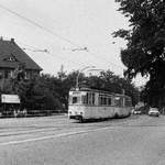 18. August 1984, Straßenbahn Dresden, In Radebeul  Weißes Ross  kreuzt ein Gotha-Zug  mit Tw 213 214 auf seiner Fahrt von Pillnitz nach Radebeul-West die Gleise der Schmalspurbahn Radebeul-Ost - Radeburg. 

