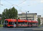 Straenbahn Tw 2503 der DVB AG Typ  NGT6DD mit Vollwerbung fr versatel  ISDN und DSL fr Dresden internet telefon entertainment  als Linie 9 nach Kaditz Riegelplatz; 26.08.2007  