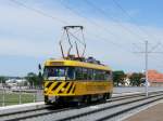 Tatra-Triebwagen 201 122 Fahrleitungs-Inspektion im Einsatz auf der neu angelegten Trasse fr die Verlngerung der Straenbahnlinie 10 zwischen Dresden-Friedrichstadt und Messe (vormals Schlachthof)