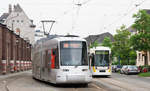 Damals, als die NF8U noch regulär auf Straßenbahnlinien anzufinden waren, konnte ich Wagen 3372 am 5.11.2013 an der Haltestelle Merowingerstraße auf der Fahrt zum ehemaligen