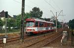 Auf dem Weg von Krefeld nach Düsseldorf durchfährt der GT8S 3034 im Sommer 1979 Meerbusch. Mit der Gründung des Vekehrsverbundes Rhein-Ruhr wurde ab dem 01.06.1980 aus der Linie K die 76 (später U 76).