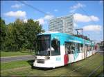 Niederflur-Straenbahnwagen 2148 der Rheinbahn vom Typ NF6 (Baujahr 1999), eingesetzt auf der Linie 703, hat gerade die Haltestelle am Jan-Wellem-Platz verlassen.