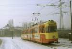 Achtachsiger Einrichtungs - Gelenktriebwagen 1231 auf der Ehinger Strae im Einsatz auf der Linie 4 im Januar 1985