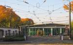 Blick in den EVAG Betriebshof in der Nordhuser Strae in Erfurt am 21.10.2012, mit einer abgestellten Plasser & Theurer 08-75/4ZW Stopfmaschine der Erfurter Gleisbau GmbH.