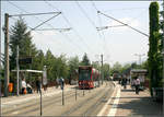 Mit der Straßenbahn in den Freiburger Westen -

Die Verzweigungshaltestelle Runzmattenweg. Hier trennen sich die Strecken der Linie 1 nach Landwasser und der Linie 3 nach Haid. 

11.05.2006 (M) 