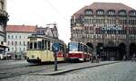 Straßenbahn Görlitz, Niederschlesien__Tw 13 [T57; 1958	VEB Gotha, ex Halle/Saale; +1992] und Tw 002 [KT4D-C; 1987 ČKD Tatra, spätere Nr.2302] an der Haltestelle Demiani-Platz vor