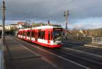 MGT6D Nr. 655 der HAVAG passiert am Nachmittag des 24.02.2016 die Kröllwitzer Brücke in Halle auf dem Weg als Linie 7 nach Büschdorf.