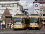 Zwei Karlsruher Straenbahnen stehen in Karlsruhe Marktplatz am 14.08.2008 nebeneinander.