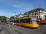 Karlsruhe w 303 ist bisher der einzige Straenbahnwagen in den neuen krftigeren Farben. Am 13.06.2013 entstand diese Aufnahme vor dem Hauptbahnhof.