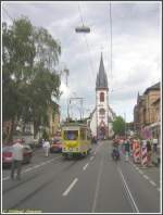 Am 03.06.2007 fuhr ein Straenbahncorso durch Mainz-Gonsenheim, um die 100jhrige Wiederkehr der ersten Fahrt der elektrischen Straenbahn nach Gonsenheim wrdig zu begehen. Der Corso wurde von dem dreiachsigen Triebwagen 97 (Baujahr 1950 Westwaggon/SSW) angefhrt, hier in der Breiten Strae vor der evangelischen Kirche aufgenommen.