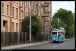 Triebwagen 80 konnte am 17. Juli 2010 auf dem Weg zum Bismarckplatz in der Karl-Metz-Strae bei dem Haupttor des Betriebshofes fotografiert werden.