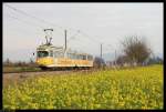 Triebwagen 1017 mit dem Beiwagen 1057 fhrt am 28. November 2010 gemchlich von Heddesheim nach Wallstadt.