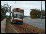 Tw 2209 in der Kurve zum Haltepunkt Bad Drkheim Bahnhof. 18.09.2011