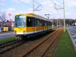 Ein DUEWAG-Stadtbahnwagen M6 der Mlheimer Verkehrsgesellschaft zwischen den Haltestellen Abzweig Aktienstrae und Lautstrae in Essen als Linie 104 zum Flughafen Essen/Mlheim am 19.