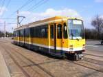Ein DUEWAG-Stadtbahnwagen M6 der MVG in der Haltestelle Grenze Borbeck in Mlheim/Ruhr als Linie 104 vom Hauptfriedhof am 19.