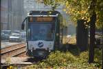 Am 27.10.2014 steht Siemens Combino 403  Freiburg im Breisgau  als Betriebsfahrt am Platz der Einheit.