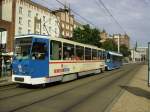 RSAG Tw 708 und Beiwagen sind am 23.08.2011 in der Rostocker Innnenstadt als Line 1 auf dem Weg nach Ltten-Klein, Rgener Strae.