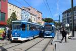 Rostock RSAG SL 1 (T6A2M 802) / SL 5 (Dwag/DWA-6NGTWDE 690) Doberaner Platz am 16. Juli 2013.