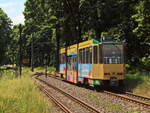 Wagen 28 SRS (Schöneicher-Rüdersdorfer Straßenbahn GmbH) vom Typ Tatra KT4D hier auf der Linie 88 in Richtung Berlin Friedrichshagen an der Berghof Weiche in Rüdersdorf am 09.