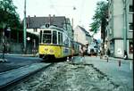 SSB Stuttgart__Gleisbau__Bei der Benckendorffstr. in S-Heslach mit Linie 1 nach Fellbach. GT4 615 als BTw.__04-1974