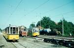 SSB Stuttgart__Endstation. Bf S-M�hringen, Schrottgleise. Bw 1380+1379+1385 [1950; Fuchs HD], A-Lok 2024 [1946; ME], L.6 nach Echterdingen mit GT4 [487] und Vollspur-G-Lok [Trelenberg Breslau; 1922] mit Kesselwagen.__06-08-1973