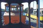 SSB Stuttgart__Endstation. Bf S-M�hringen, Schrottgleise.  Blick aus dem Gerippe eines 1500er Bw auf Schleiflok 2004 von 1946 und auf die Reste der Bw 1385 und 1379.__10-1973