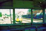 SSB Stuttgart__Endstation. Bf S-M�hringen, Schrottgleise.  Blick aus dem Fahrerhaus der Schleiflok 2004 von 1946 auf einen Zug der Linie 6 nach Echterdingen und eine Reihe G-Wagen.__06-08-1973