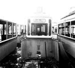 SSB Stuttgart__Endstation. Bf S-M�hringen, Schrottgleise. Hinter den Resten eines bereits abger�umten Tw sind schwach zu erkennen Tw 2002 (ex 610 von 1929), rechts davon die Nr.1 vom GT6 zu erkennen und ein GS-Tw. Der Tw 2002/610 wurde dann gerade noch vorm Schneidbrenner gerettet und geh�rt als Tw 610 zum Museumsbestand.__1968