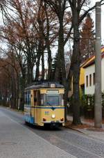 Tw 32 der Woltersdorder Straßenbahn fährt am 20.11.2015 die Schleusenstraße hinab in Richtung der Endhaltestelle Woltersdorf Schleuse