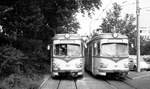 OEG__und links davon Straßenbahn Linie 2 und ein bißchen Schienenbus. OEG Tw 107[2009=4107] GT 8; 1974 DUEWAG;+2019] und Tw 86 [GT 8; 1966 DUEWAG; +2009].__1980 oder 1981