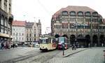 Straßenbahn Görlitz, Niederschlesien__Tw 13 [T57; 1958 VEB Gotha, ex Halle/Saale; +1992] und Tw 002 [KT4D-C; 1987 ČKD Tatra, spätere Nr.2302] an der Haltestelle Demiani-Platz vor dem Kaufhaus  Central .__12-05-1990