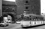 Nürnberg-Fürther Straßenbahn__Tw 312 [GT6; MAN/Siemens 1962] auf Linie 2 zum 'Dutzendteich' beim Waffenhof am Spittlertor-Turm .__15-06-1976