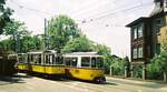 SSB Stuttgart__Tw 276 mit Bw 1241 von der Ruhbank/Fernsehturm kommend begegnet 15er Linienzug mit BTw GT4 636 an der Heidehofstr.__2006