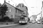 SSB Stuttgart__Sonderfahrt des Straßenbahnmuseums Stuttgart (SMS) mit Tw 418 [ME/AEG 1925; 1960-68 Rangier-Tw 2529; 1977 vom SMS als Museumswagen hergerichtet] als historische Linie 18. In der Gablenberger Hauptstraße.__12-08-1978 