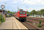 112 144-1 von DB Regio Schleswig-Holstein (DB Regio Nord) als RE 21869  Hanse-Express  (RE1) von Hamburg Hbf nach Büchen erreicht den Bahnhof Schwarzenbek auf der Bahnstrecke Berlin–Hamburg