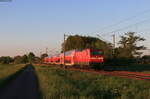 112 147-4 mit dem RE 21035 (Neumünster-Hamburg Hbf) bei Borstel 30.5.21