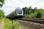 DABpbzkfa mit Schublok BR 146.2 der metronom Eisenbahngesellschaft mbH als ME 82118 (RE3) von Uelzen nach Hamburg Hbf fährt in Radbruch auf der Bahnstrecke Hannover–Hamburg (KBS 110).