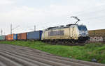 Metrans 386 021-0 mit Container kommend aus Richtung Lüneburg.