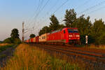 152 110 hat mit ihrem Containerzug vom Rangierbahnhof Maschen kommend bei Sagehorn bereits das Gleis gewechselt, um auf die Bremer Umgehungsbahn auszufädeln.