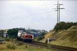 218 175 bei Morsum kurz vor dem Hindenburgdamm am 19.09.1990